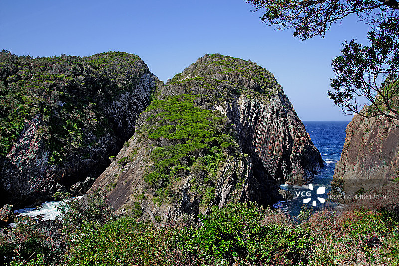糖 loaf 角灯塔附近的海岸悬崖，海豹岩图片素材
