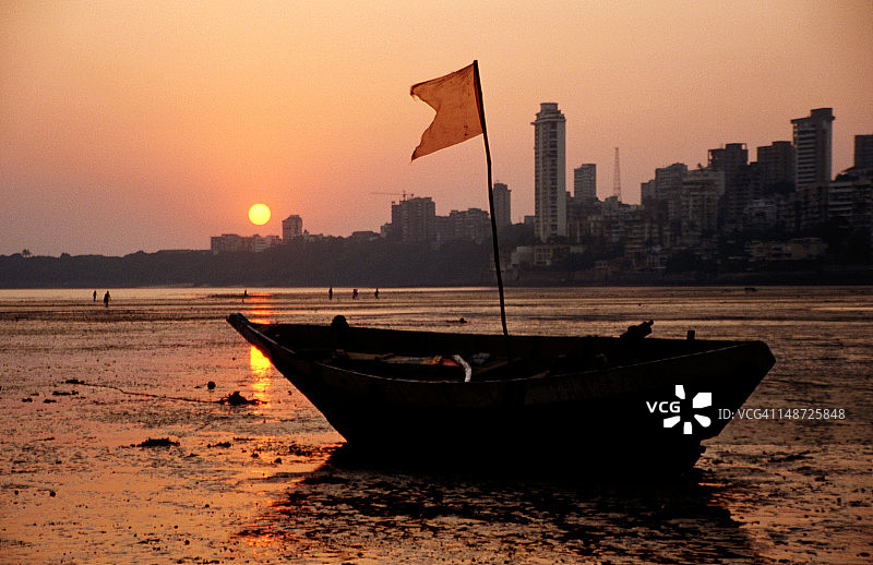 退潮时分，乔帕蒂海滩日落景色图片素材