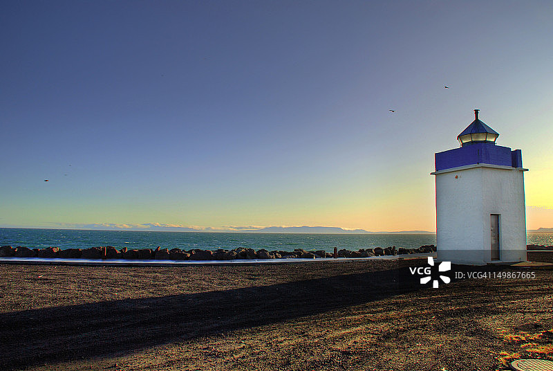 凯夫拉维克法罗灯塔的日出图片素材