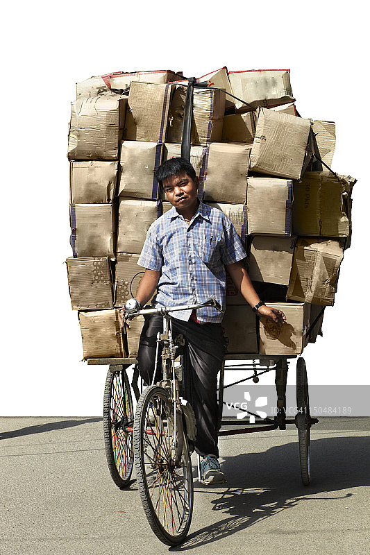加德满都骑自行车运货的商贩图片素材