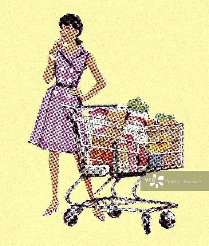 推着装满购物车的女人图片素材
