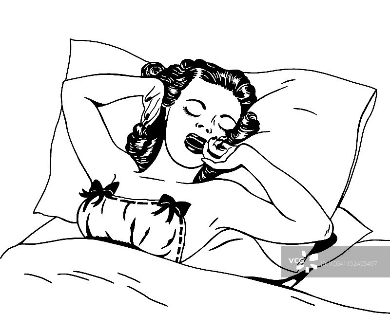 女人在床上伸展身体图片素材