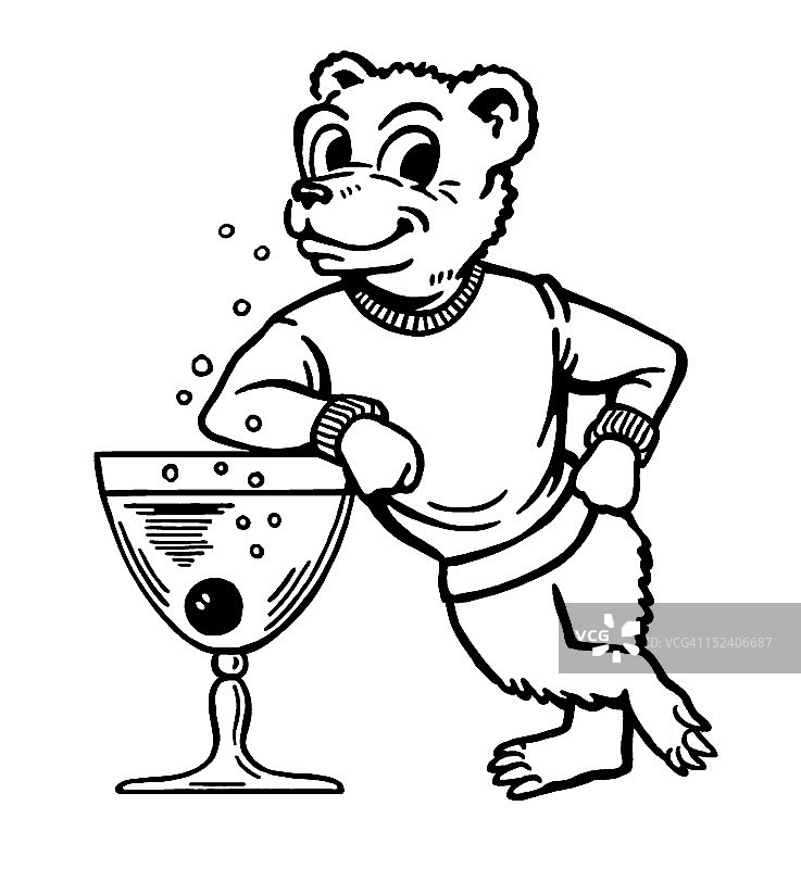 熊倚靠在鸡尾酒旁图片素材