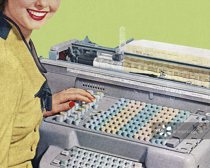 女人使用办公设备图片素材