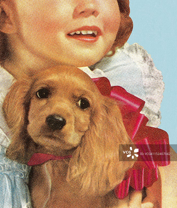 手持可卡犬的女孩图片素材