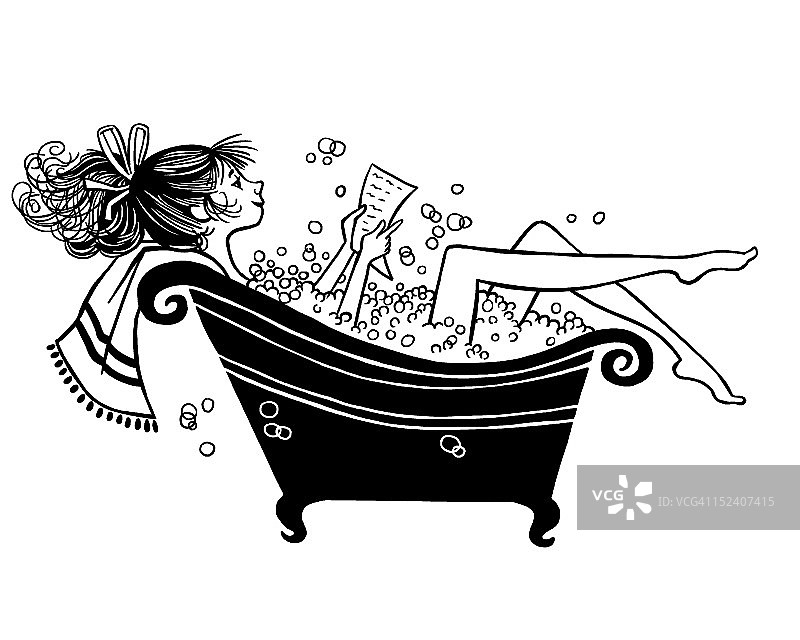女人在泡泡浴中阅读图片素材