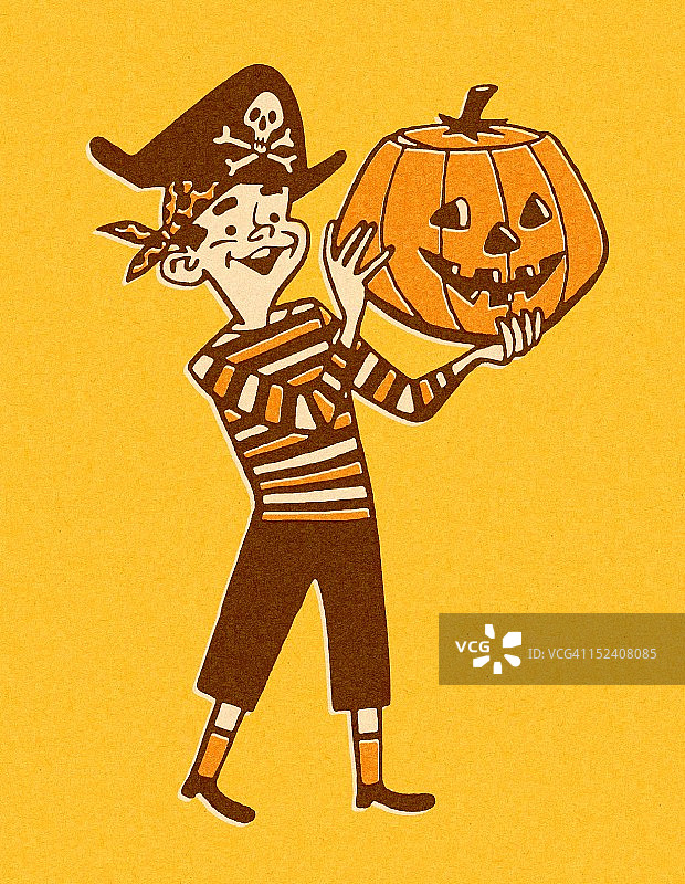 手持万圣节南瓜灯的海盗男孩图片素材