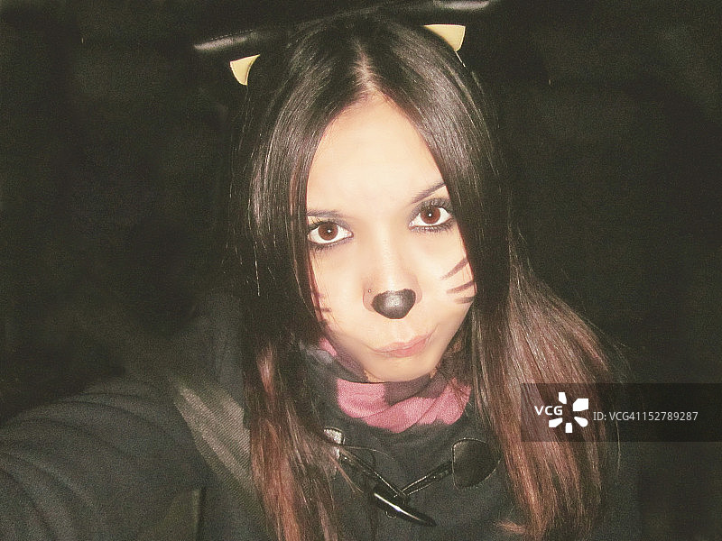 画着猫妆的女人 портрет图片素材
