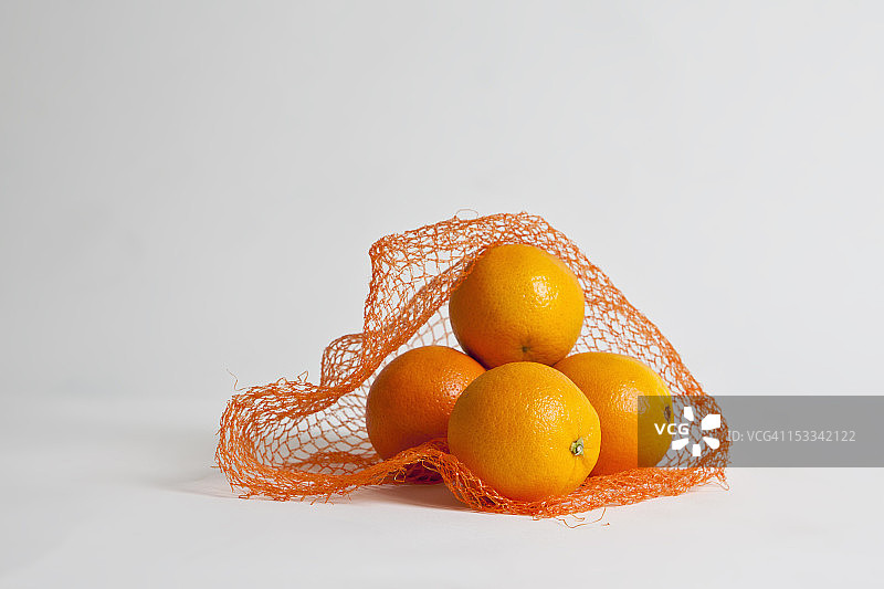 网袋里的一堆橙子图片素材