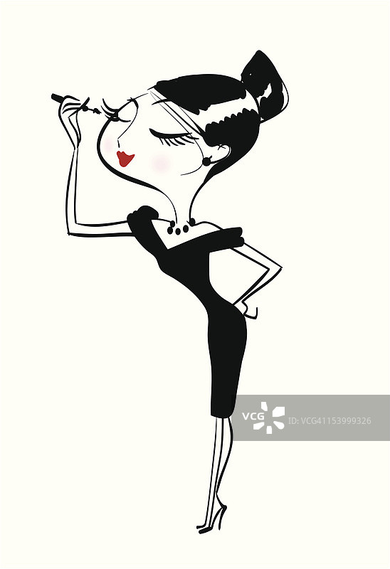 女人涂睫毛膏图片素材