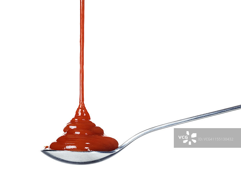 番茄酱倒在勺子上图片素材