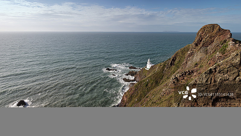 德文郡悬崖顶灯塔海岸风光图片素材