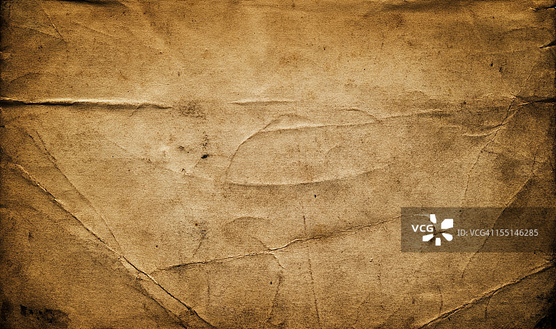 风化褶皱的复古纸张背景图片素材