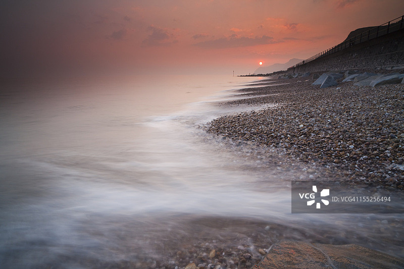 多塞特郡侏罗纪海岸的火山灰日落图片素材