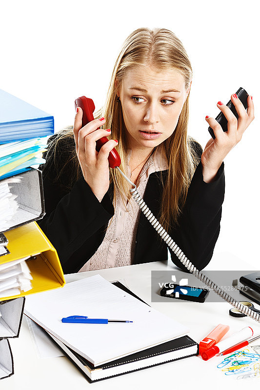 同时处理多项事务，手忙脚乱的女商人图片素材