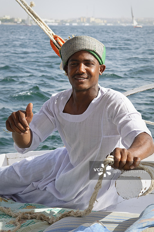 尼罗河上的生活 - 阿斯旺的三角帆船船长图片素材