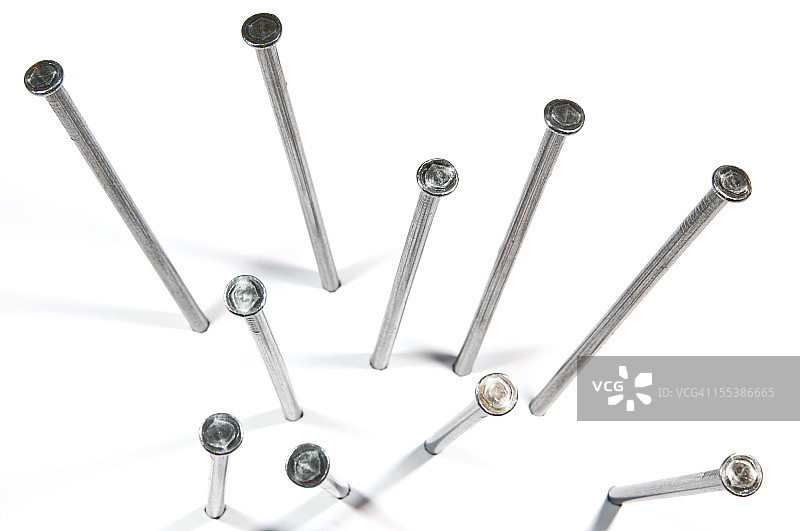 准备敲击的十个钉子图片素材