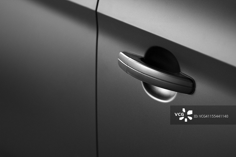 黑色汽车门把手特写图片素材