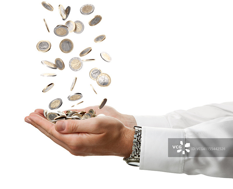 商人用手接住掉落的欧元硬币图片素材