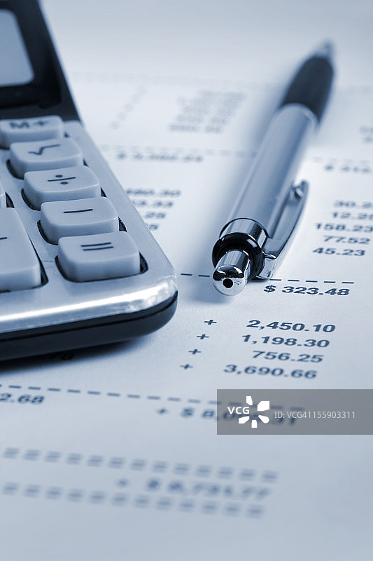 财务报表附笔和计算器图片素材