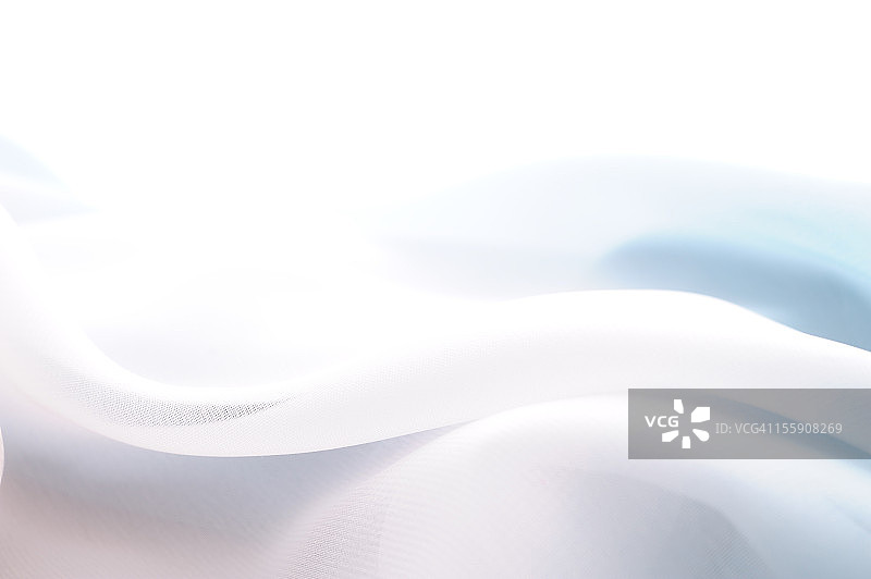 从白色到蓝色的渐变丝绸图片素材