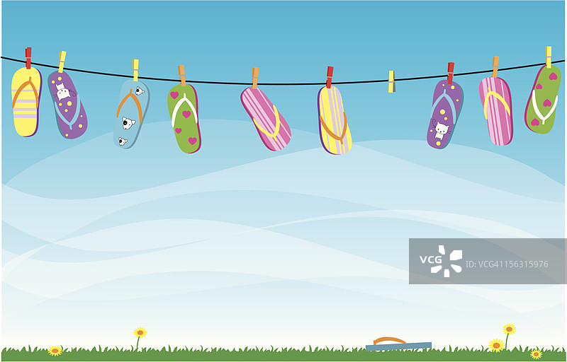 晾衣绳上挂着的各式人字拖图片素材