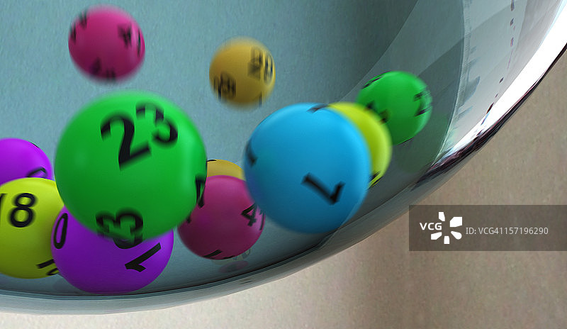 容器内滚动的彩票号码图片素材