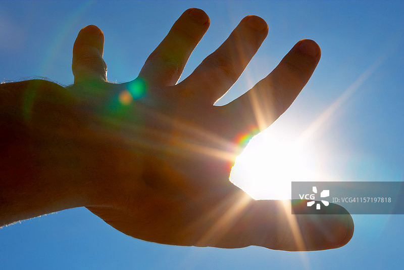 触及太阳图片素材
