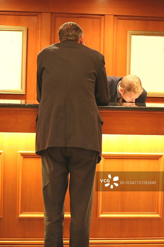 商人办理入住图片素材