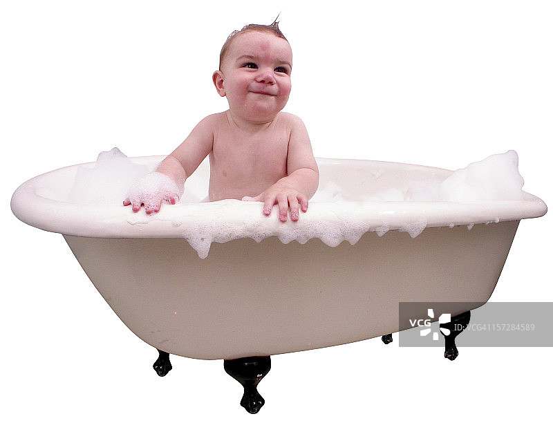 在浴缸里的婴儿图片素材