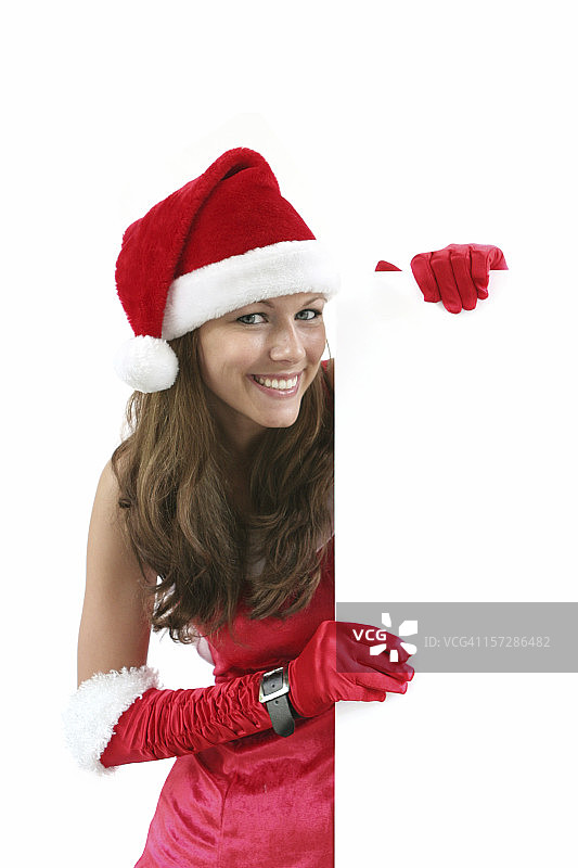 拿着标牌的圣诞女孩图片素材