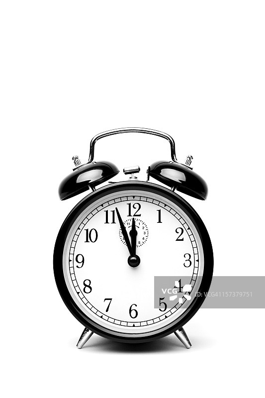 白色背景上的黑色闹钟图片素材