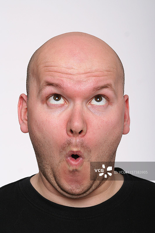 面部扭曲的男子图片素材
