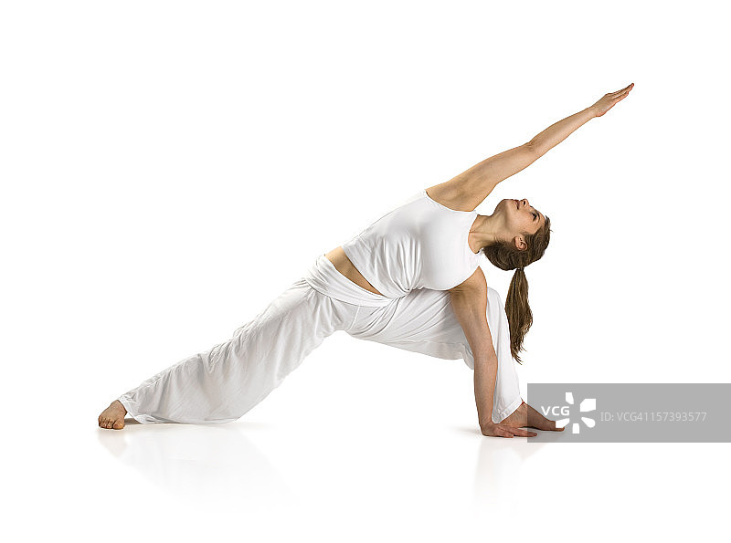 女人在白色背景上做瑜伽图片素材