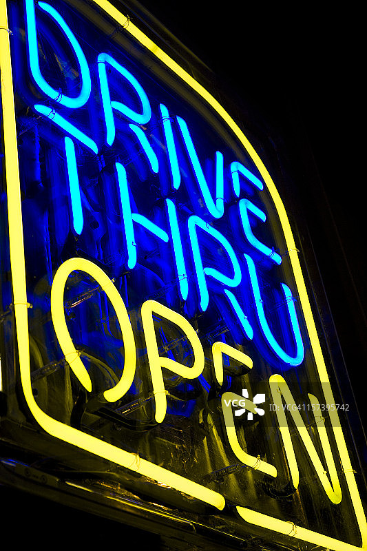 蓝黄色霓虹汽车穿梭餐厅标志图片素材