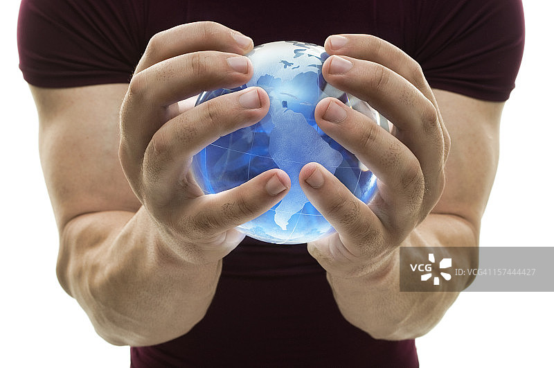 手中的地球仪图片素材