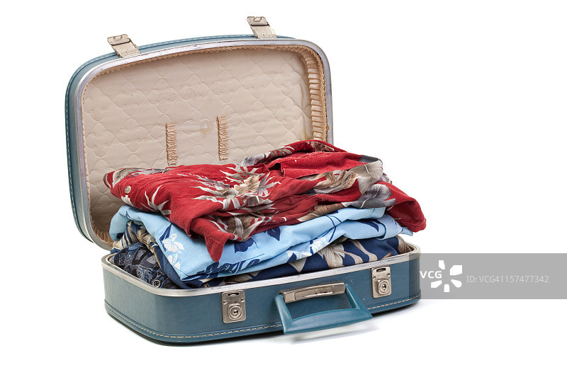 装满衣服的蓝色手提箱图片素材