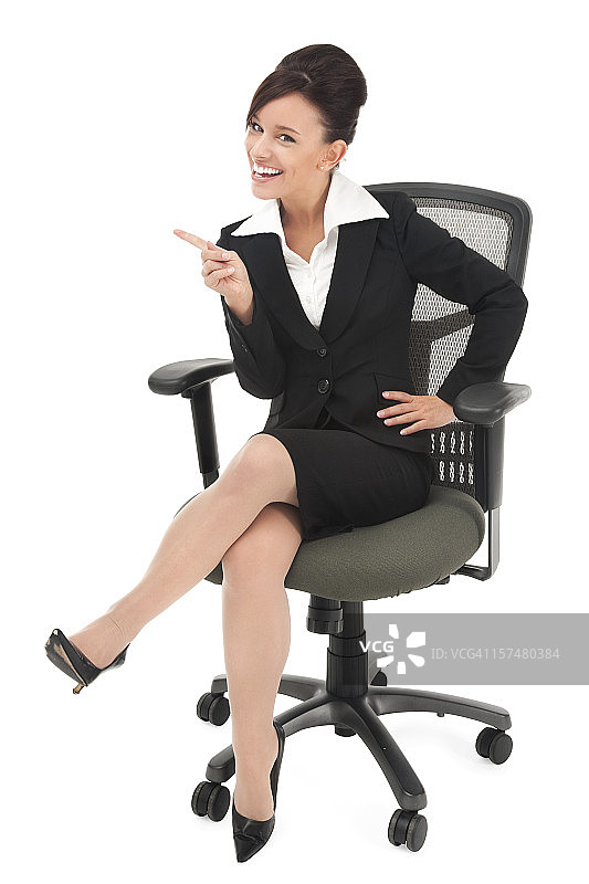 摆手指的年轻女商人图片素材