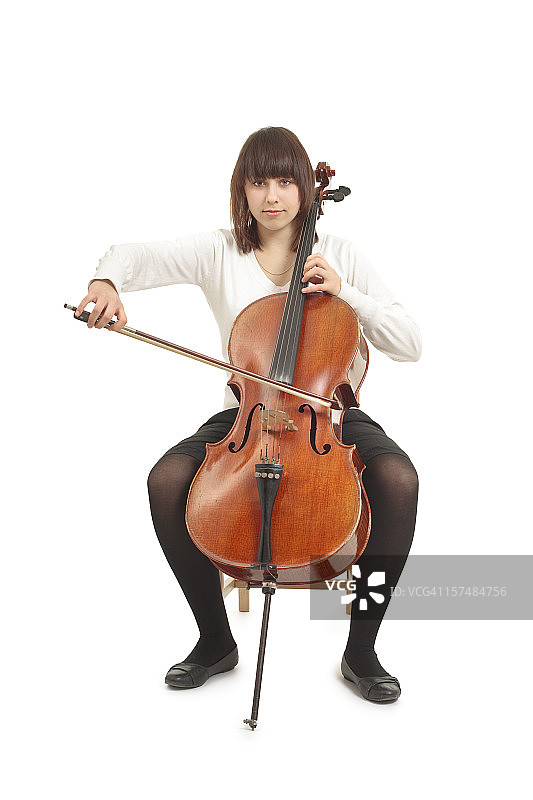 拿着大提琴的青少年图片素材