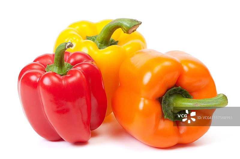 三个甜椒，一个红色，一个黄色和一个橙色图片素材