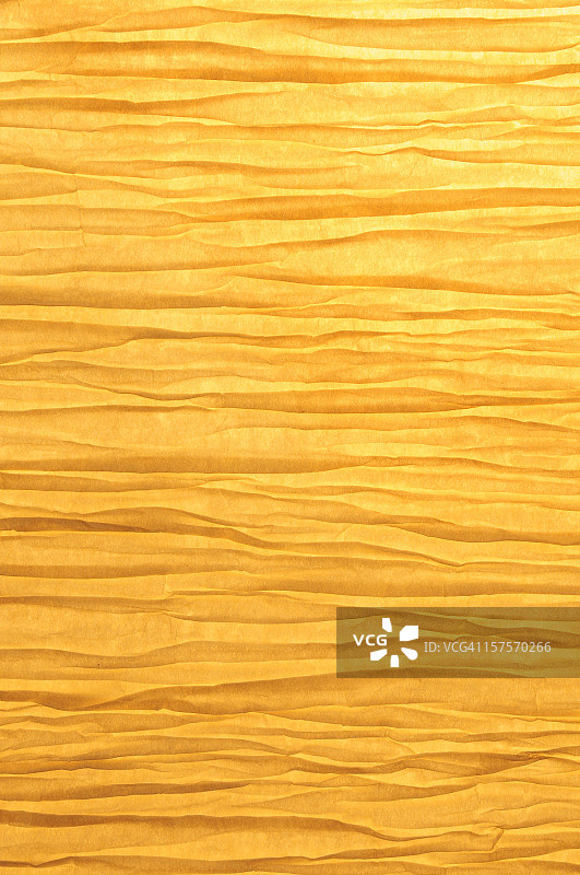 背光金色的禅意褶皱纸背景图片素材