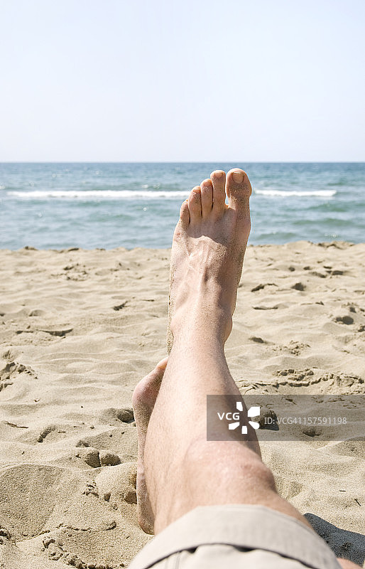 沙滩上的腿和脚图片素材
