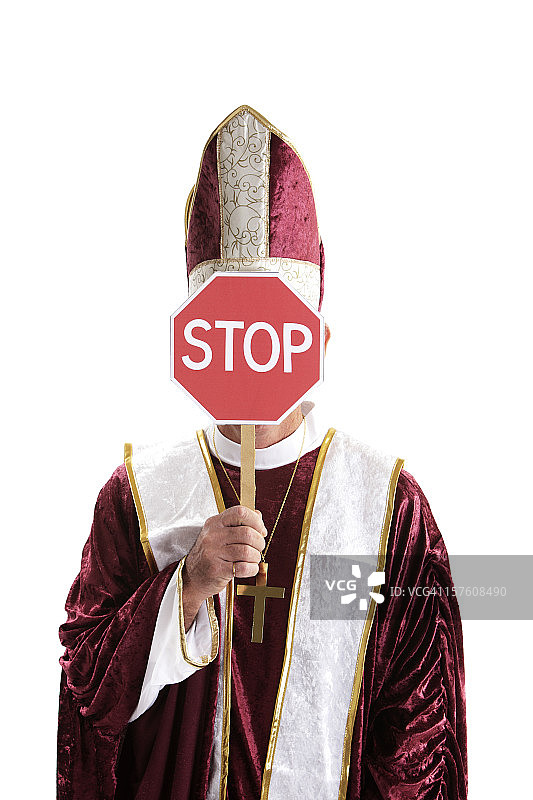 手持停止标志的牧师图片素材