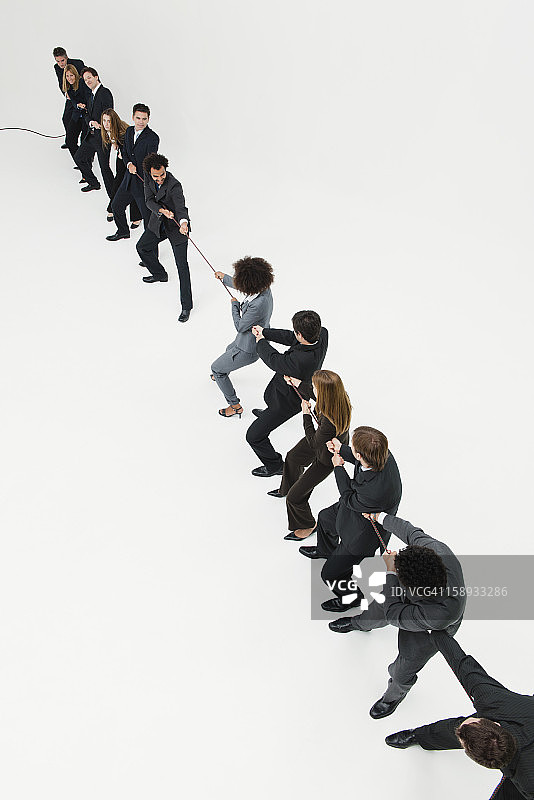 商业人士拔河比赛图片素材