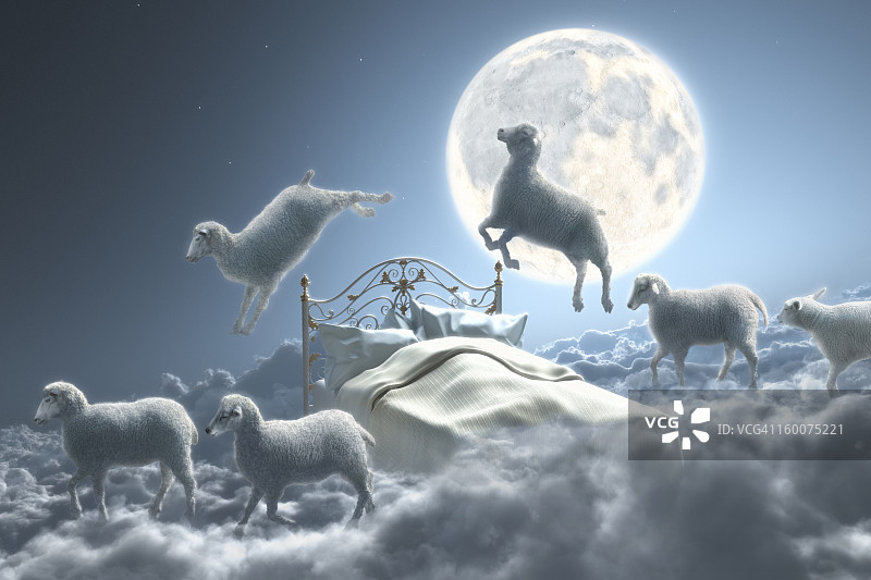 多云月夜下跳过床的绵羊图片素材