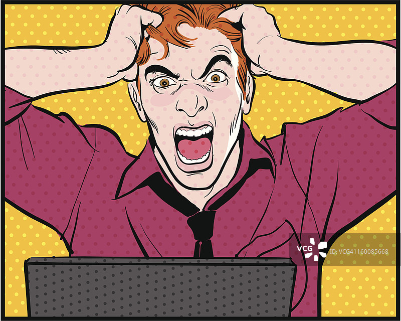 男子使用电脑，大喊大叫并抓头发图片素材