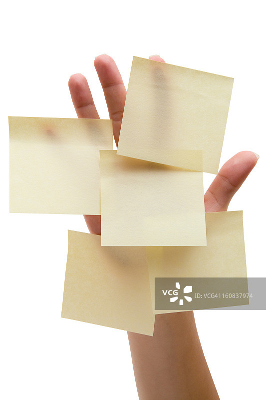 手上的便签（含裁剪路径）图片素材
