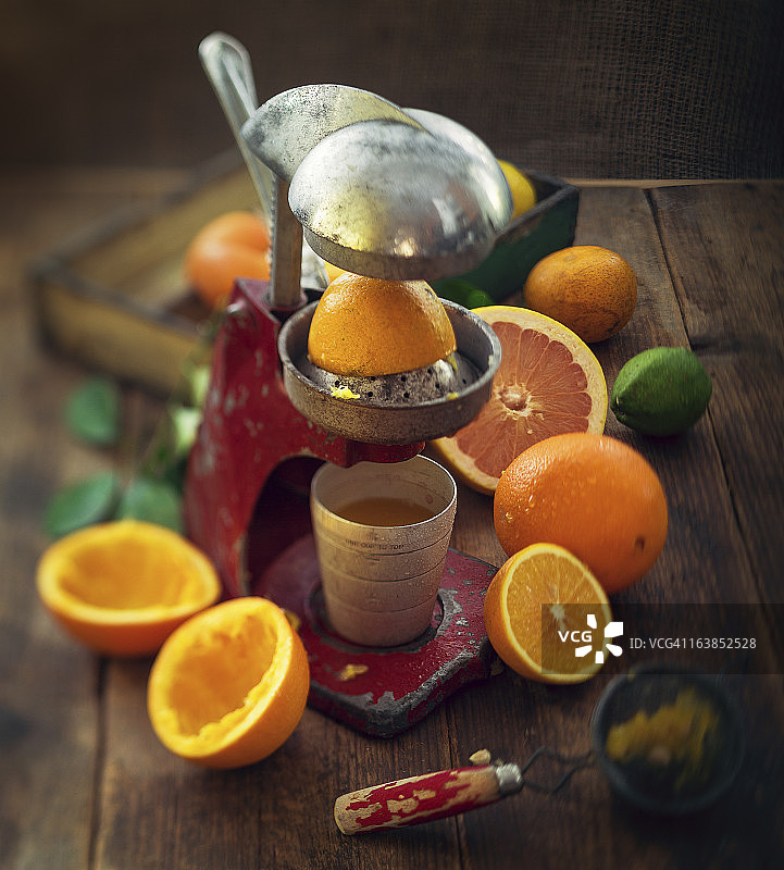 柑橘和榨汁器图片素材