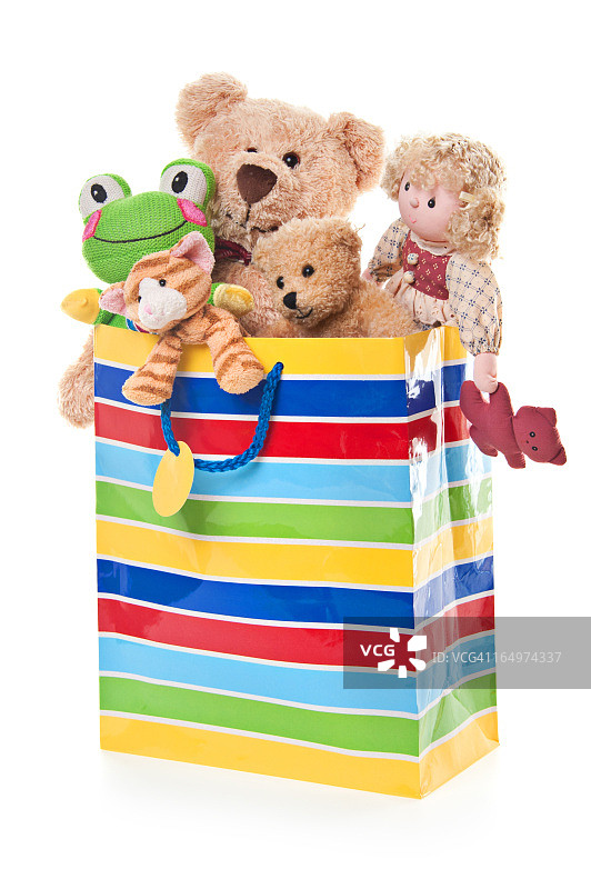 装有泰迪熊和玩具的生日礼品袋图片素材