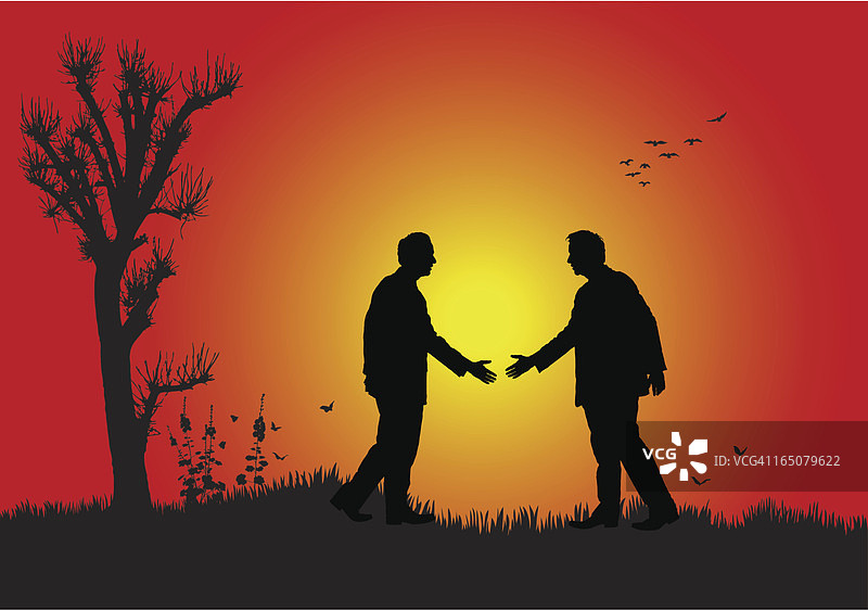 日落时的握手图片素材